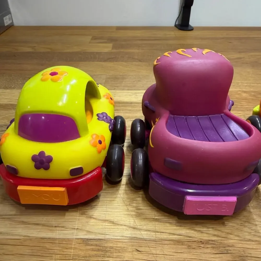 B. Toys Pull Back Trucks Taxi Cab Convertible Lot of 4 Flower Car Play Imaginati